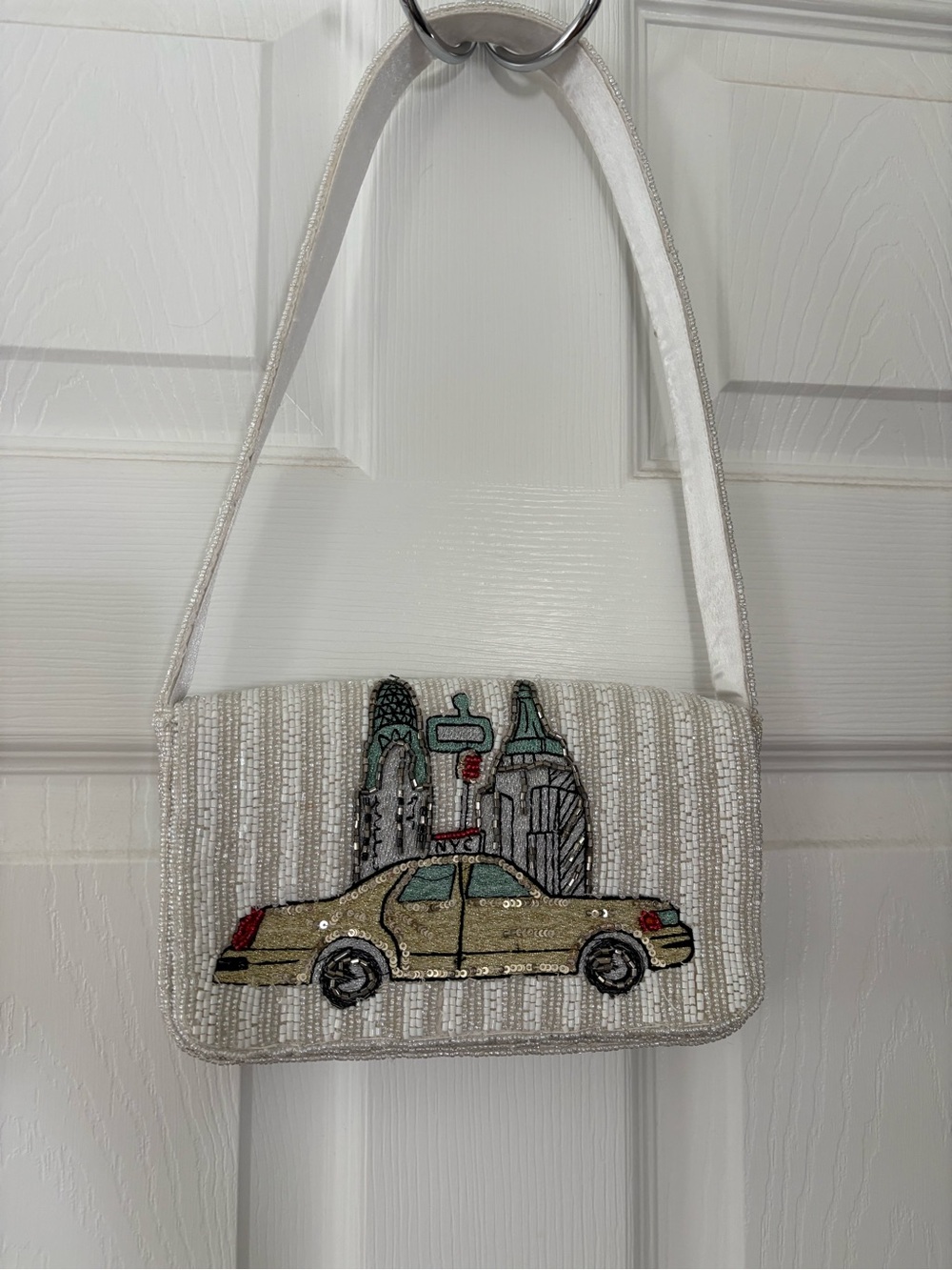 Beaded purse made in India featuring NY Taxi. New with tags.